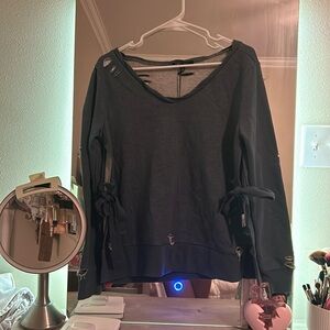 Romeo and Juliet Couture ripped styled, side cut-out sweater